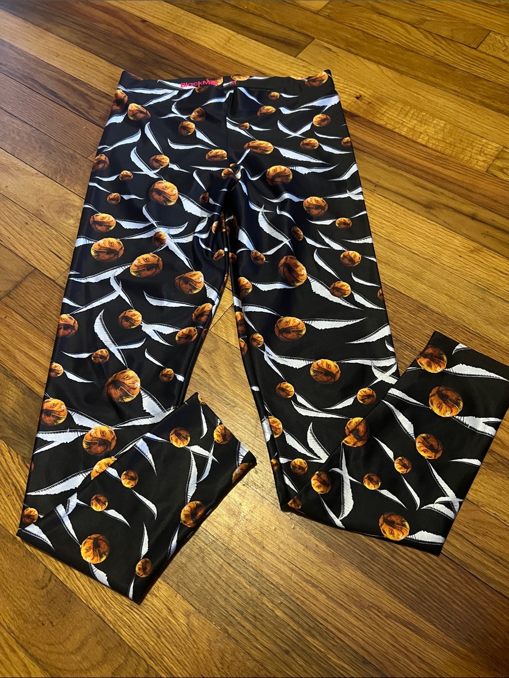 Blackmilk Black Snitch leggings inspired from the Harry Potter movies.